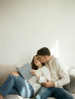 Load image into Gallery viewer, Couple sitting on couch together with Engagement Journal