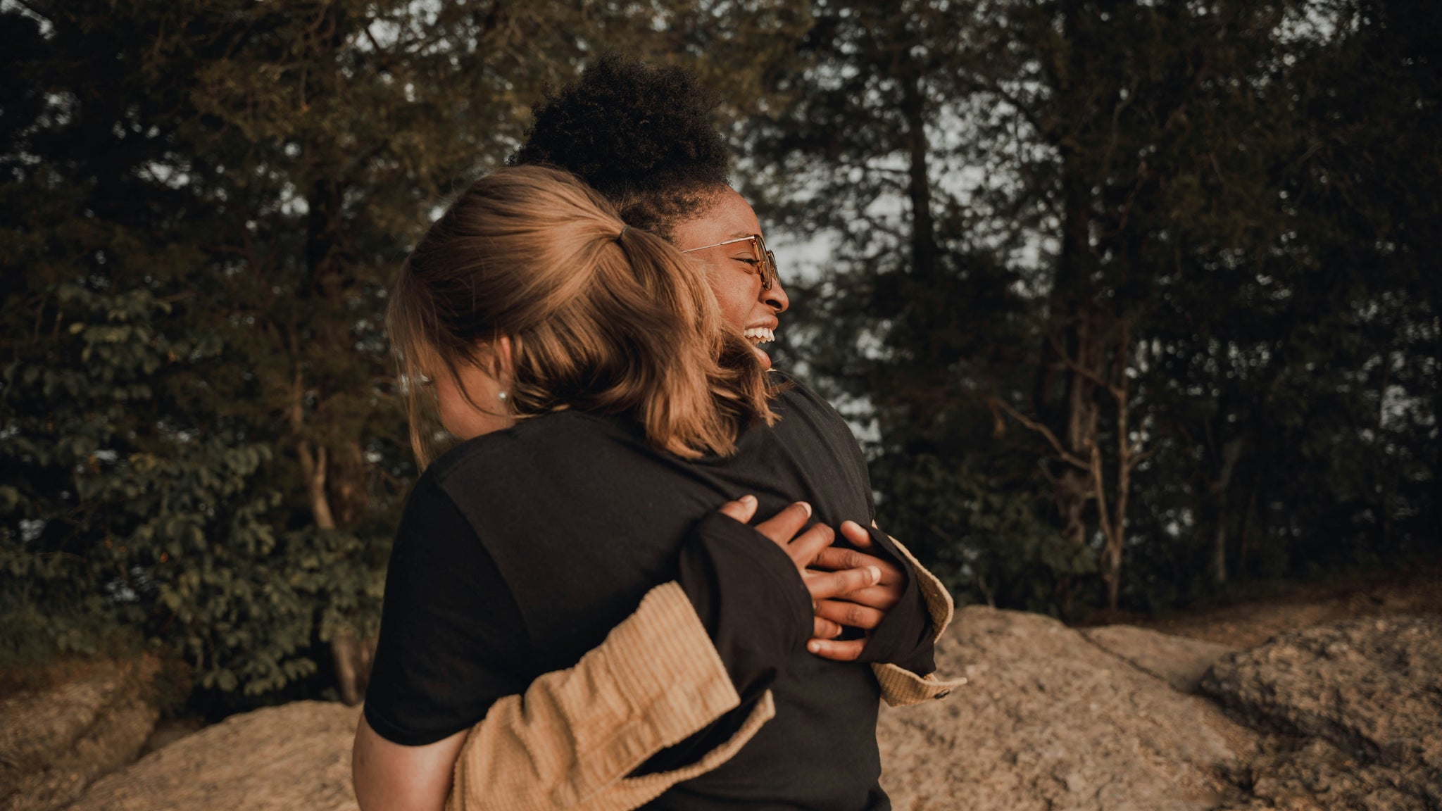 Two friends hugging