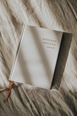 Load image into Gallery viewer, Everyday Positive Journal on linen blanket
