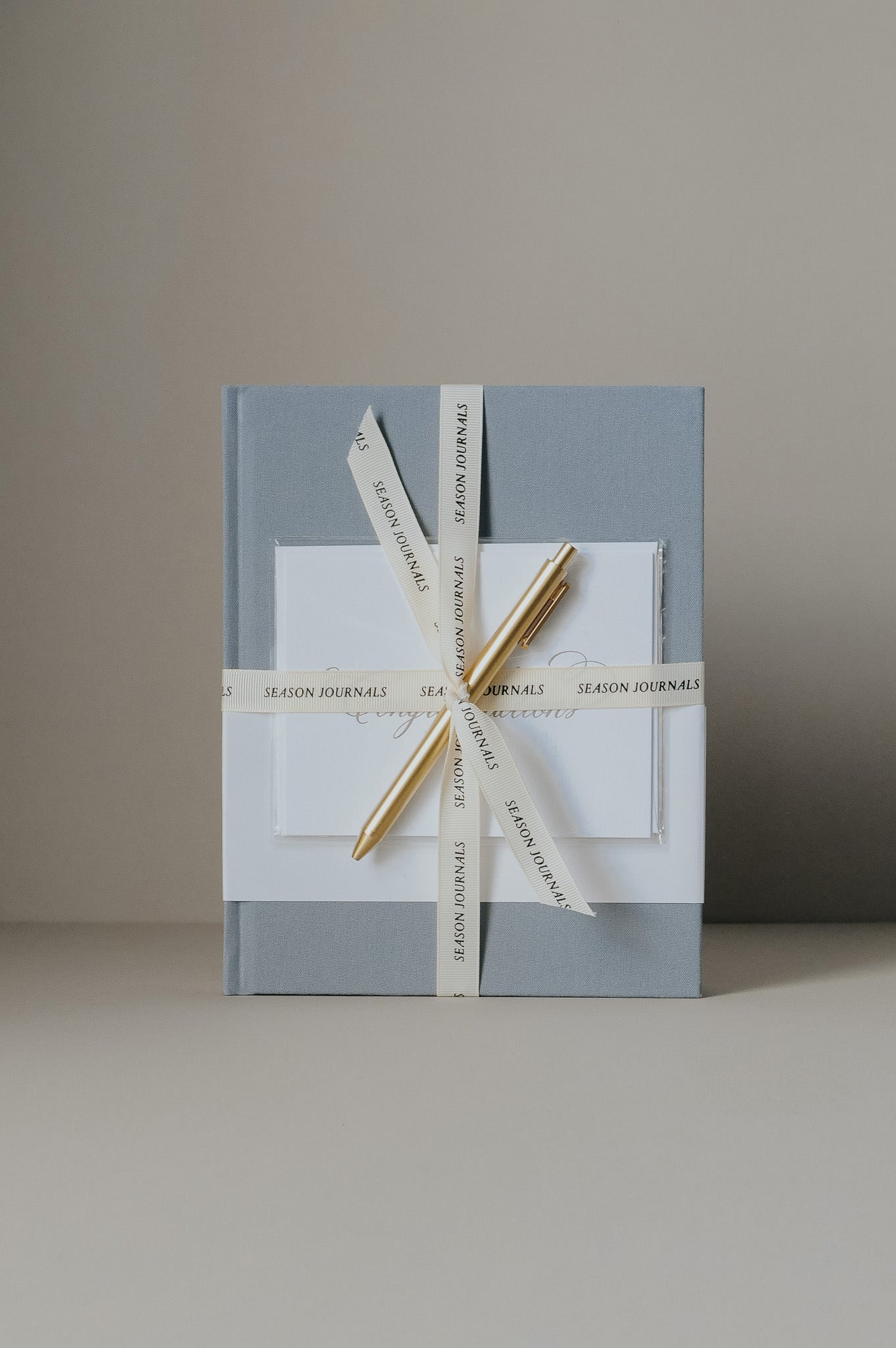 Engagement Journal with congratulations card, gold pen, tied with ribbon