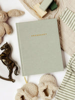 Load image into Gallery viewer, Sage green Pregnancy Journal styled with blanket, blocks, stuffed bunny, sage green baby outfit
